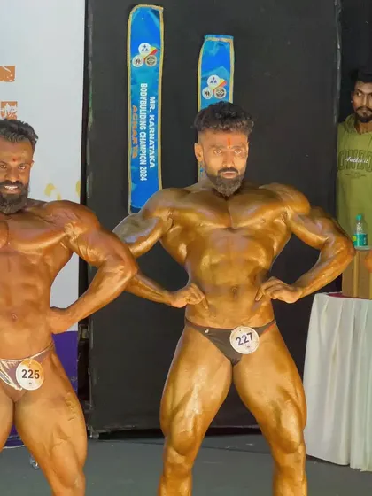 Standing on stage with fellow competitors. The bodybuilding community is built on mutual respect for the hard work and dedication we all share.