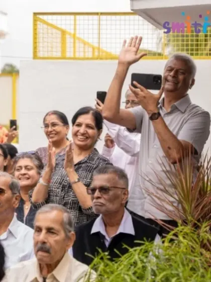 A grandfather waves and records his grandchild's performance, his face beaming with pride. These moments of connection are what our community is all about.