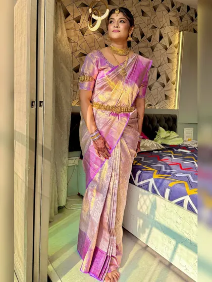 A full-length view of the bride in her gorgeous silk saree, showing how the entire look comes together.