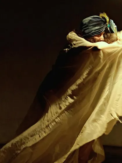 A powerful image of movement and fabric from one of my solo pieces. The costume becomes an extension of the body, creating dynamic shapes and telling its own story.