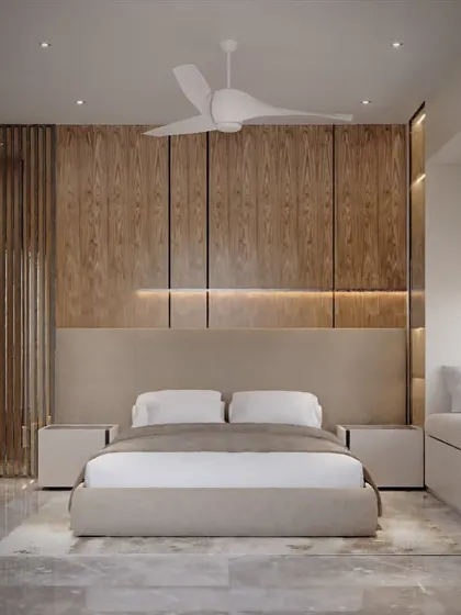 This version of the wood-paneled bedroom shows the addition of mirrored wardrobe doors. This not only adds a touch of glamour but also reflects light and makes the room feel more spacious.