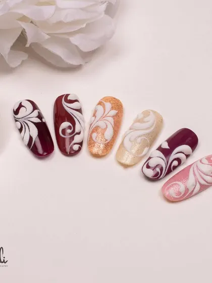 A collection of embossed swirl designs using the sand technique for a unique, sugary texture. The rich, warm tones are perfect for an elegant look.