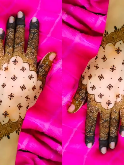 This is an example of a modern Pakistani-style design. The combination of a bold border, delicate 'buti' (dots), and intricate finger details creates a look that is both traditional and chic.