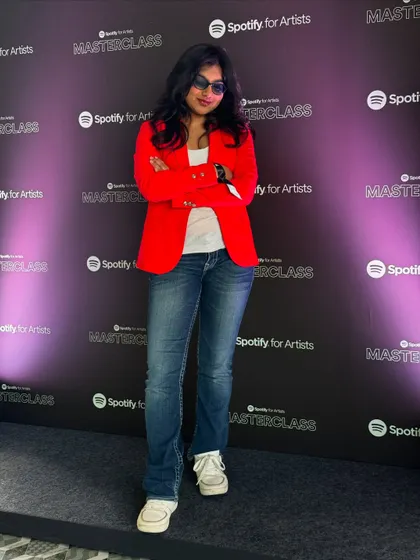 Posing for a photo at the Spotify Masterclass. It was an incredible opportunity to represent the indie scene and share my experiences.