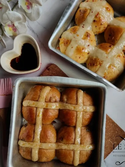 My eggless Hot Cross Buns are an Easter special. They are soft, spiced, and available in both a traditional style and a cheesy version for a savory twist.