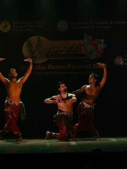 A moment of stillness and intensity from a Chhau trio performance. The grounded poses and focused expressions convey the discipline and control required in this martial art form.