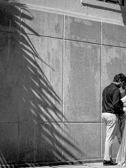 A duplicate of image 80, this black and white architectural shot emphasizes the artistic composition of the maternity portrait.