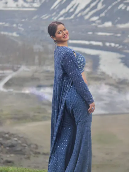 The back view of the co-ord set, highlighting the long jacket and flowing pants.