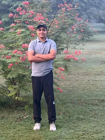 Posing in a park in Noida Sector 50.