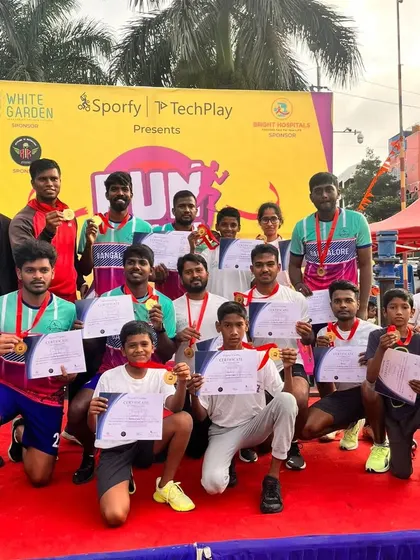 A proud podium moment for our team at a 5k charity run. It's great to see the hard work pay off with medals and certificates, recognizing the effort everyone puts in.