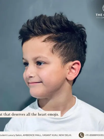 The final result of this cool kid's haircut. The textured top and clean sides make for a stylish and fun look.