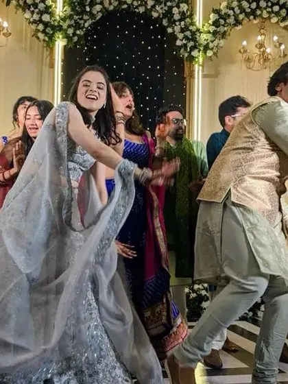 The coolest bride dancing with her cousins. These group dances create some of the most fun and lasting memories from the wedding.