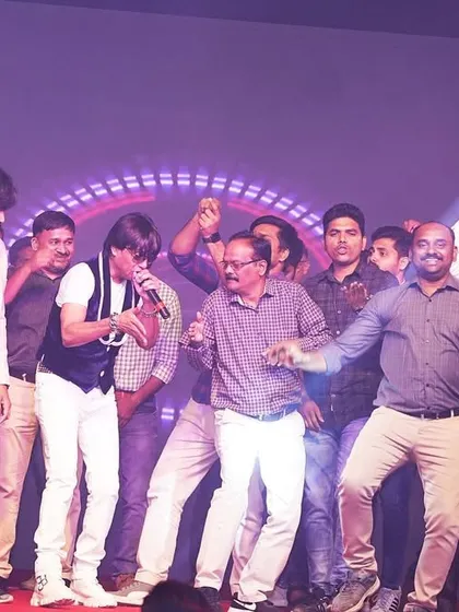 The audience joining me on stage for a dance. This is what a successful corporate party looks like.