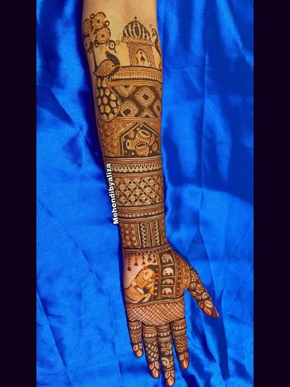 The same beautiful bridal arm design, showing the intricate details from another angle.