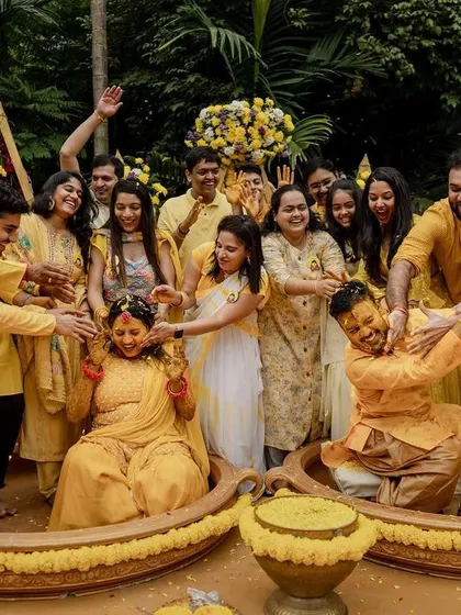 The grand entrance with colorful smoke bombs makes for an epic start to the Haldi festivities. We love capturing the energy and excitement of the wedding party.
