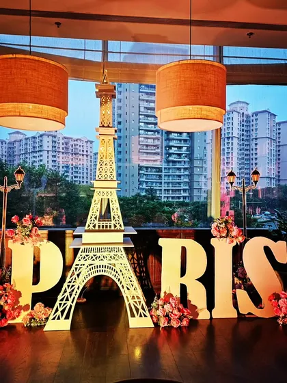 Themed events are my specialty. This Paris themed setup for The Quorum Club features a custom Eiffel Tower prop, large marquee letters, and floral arrangements, transporting guests to a different city for the night.