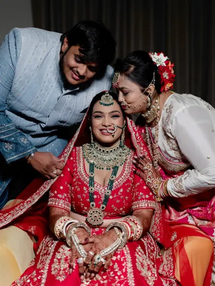Another beautiful family photo. The bride's makeup is designed to be long-lasting and picture-perfect, capturing the emotions of the day.