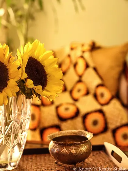 A different perspective of the sunflower throw, with the focus on the fresh flowers. It shows how my creations are inspired by nature.