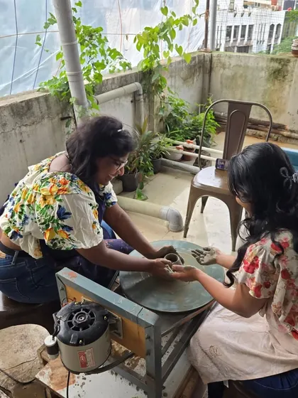 Our studio is a great place for friends to connect and create too. Here are two friends enjoying a pottery session together on a sunny afternoon.