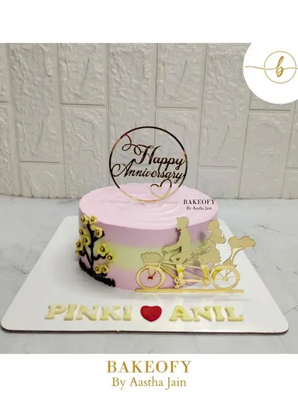 Love is in the air with this sweet anniversary cake. This chocolate mousse cake features a romantic bicycle topper and was inspired by another artist I admire.