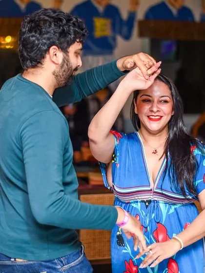 A graceful turn and a radiant smile. This is the kind of positive energy that fills our venue every Sunday night.