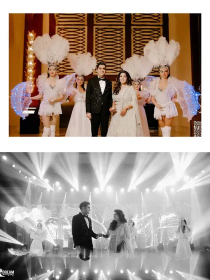 The grand stage performance at Isht and Paavni's Dubai celebration, complete with feathered dancers.