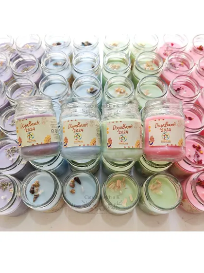 A closer look at the jar candles for the Singapore client, featuring their custom "DiyaBaati 2024" logo sticker.