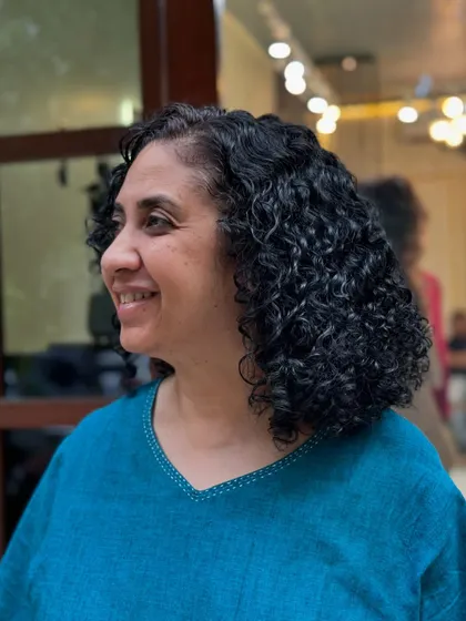 More examples of my short curly haircuts, from bobs to layered chops, each one personalized to the client's curl pattern and face shape.