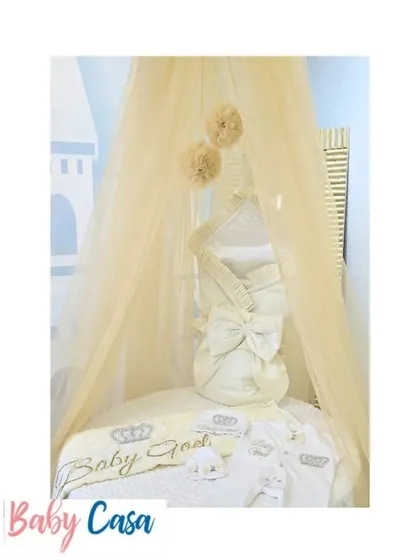 A complete nursery setup featuring one of my homecoming sets. This image shows how a personalized sleeping bag and matching accessories can be displayed beautifully in the crib, waiting for the baby.