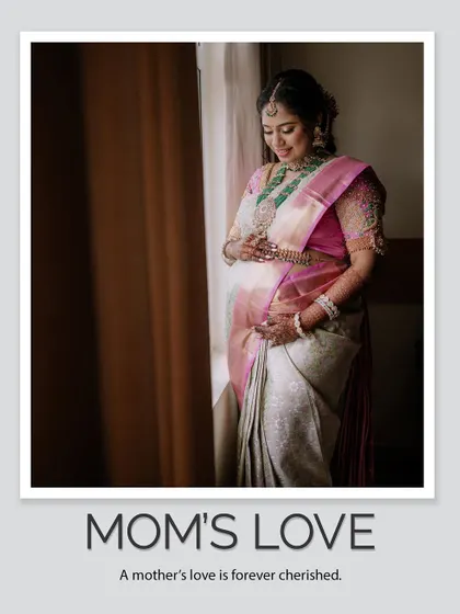This portrait captures the serene beauty of an expectant mother in traditional attire. The soft natural light from the window illuminates her gentle smile as she cradles her baby bump, showcasing a moment of pure maternal love.