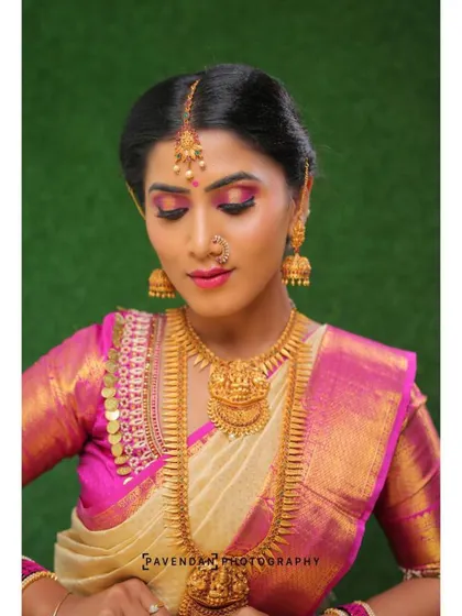 A duplicate of image 18, this close-up emphasizes the flawless eye makeup and radiant skin finish, which are signatures of my bridal work.