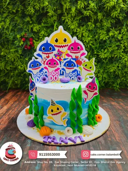 Doo doo doo! A fun Baby Shark cake with the whole shark family. The underwater theme with seaweed and shells makes it a splash at any kid's party.