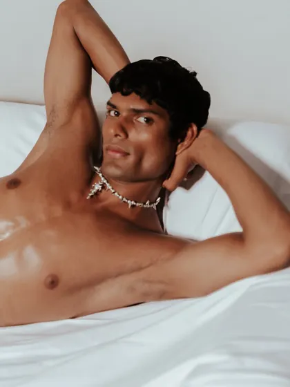 A close-up portrait from the bed series, creating a personal and intimate connection with the viewer. The focus is on the model's expression, adding a layer of personality to the campaign.