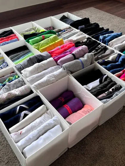 Many Indian wardrobes have shelves instead of drawers. I use organizers like these from IKEA with the file folding method to optimize space and make all items clearly visible.