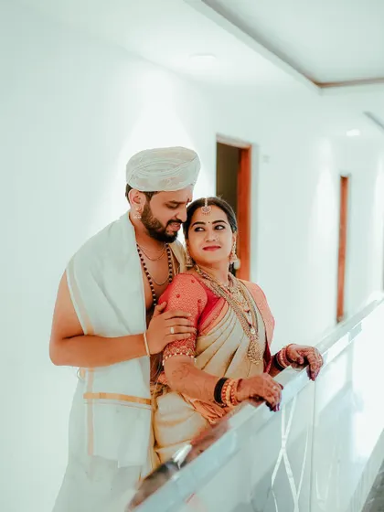 A tender and loving portrait of the couple, their comfortable embrace showing their deep connection.