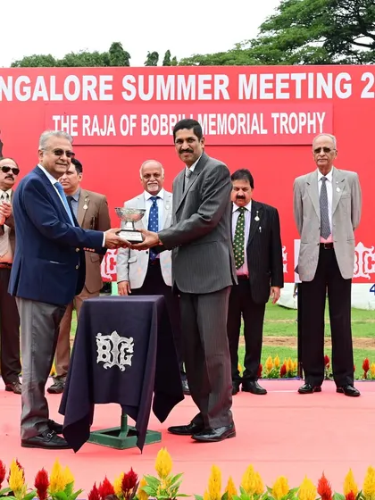 Mr. Dayanand R. Mandre presents The Raja of Bobbili Memorial Trophy to the winning owner of Armory.