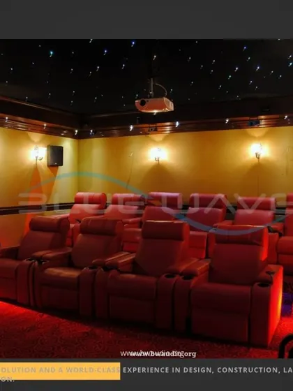 This project showcases a classic tiered seating layout with red leather recliners. The raised platforms ensure that every seat has a clear, unobstructed view of the screen, just like in a commercial theater.