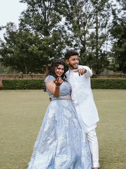 A fun, pointing pose from our engagement shoot. We encourage couples to be themselves and let their personalities shine through.