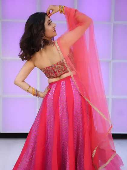 Another angle showing the back detail and the sheer pink dupatta.