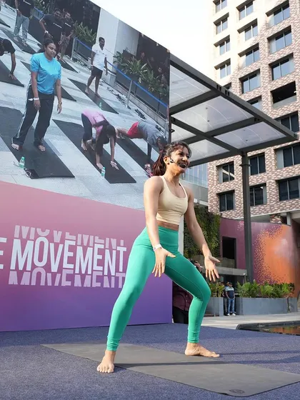 I love teaching fitness; it gives me immense joy and purpose. Here I am on stage, leading a WARRIOR Rhythm session for the Lululemon team in Bangalore. Moments like these make the whole journey worthwhile.