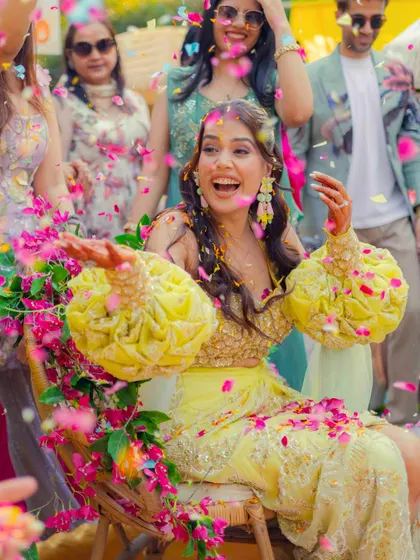 The pure, unadulterated joy of a Haldi ceremony. I live for these unscripted moments. The explosion of color, the unrestrained laughter, and the shower of flower petals are the real story. It’s not about posing; it’s about capturing the energy and happiness as it unfolds.