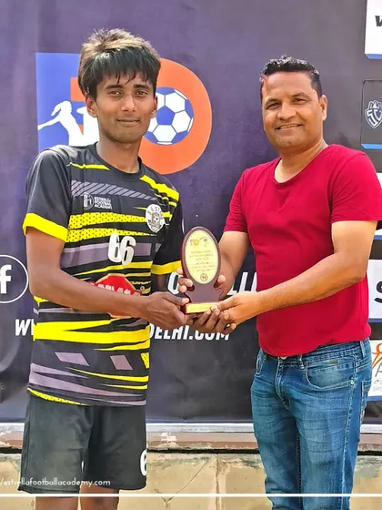 Our player receiving a "Best Player of the Match" award in the B Division League, a testament to his hard work and standout performance.
