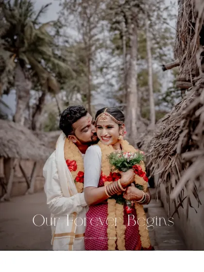 'Our Forever Begins'. A romantic shot of the groom whispering to his bride in a rustic, natural setting.