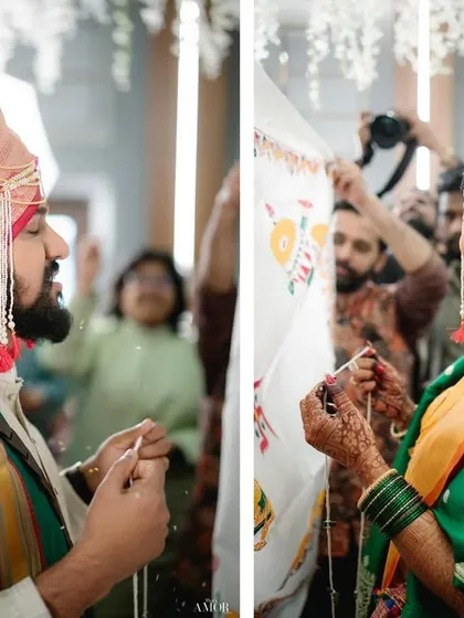 The moment the Antarpat separates the bride and groom. The image captures both their profiles during this significant Maharashtrian ritual, with guests watching in the background.