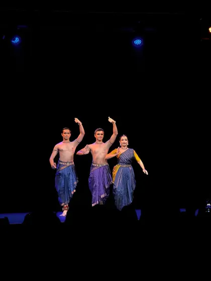 A wide shot of the 'Abha' performance in Europe. Performing on international stages allows us to share our art with diverse audiences.