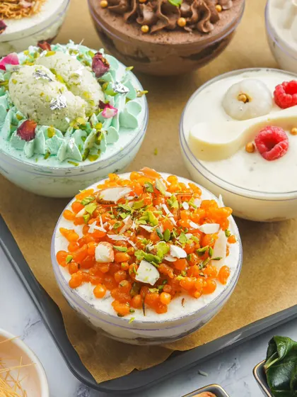 A tray showcasing the variety of fusion globe cakes. Each one is designed to be hamper-friendly and quick to assemble, making them ideal for festive and corporate orders.