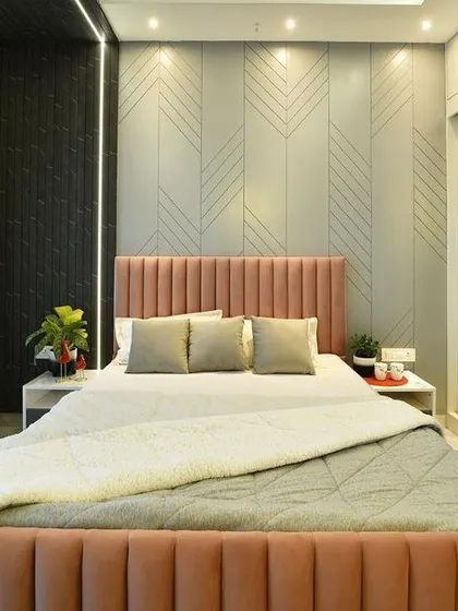 The final executed version of the bedroom render, showing the beautiful pink channel-tufted bed and the textured grey accent wall. The mirrored wardrobe reflects the room, making it feel larger and brighter.