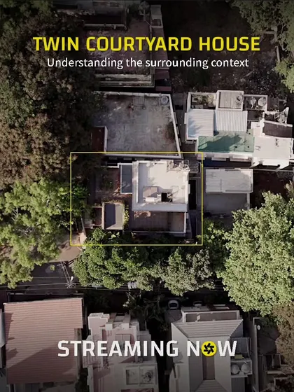 An aerial view showing the project's context within a dense Bangalore neighborhood. This highlights the challenge we addressed: creating a private, light-filled oasis on a constrained urban site.