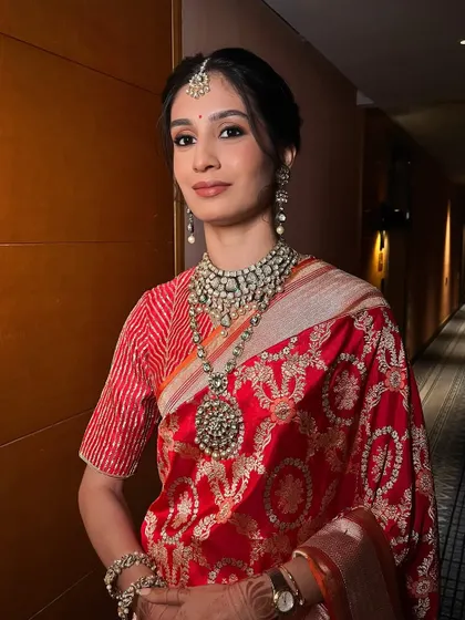 One of my favorite looks on a sister of the bride. This very traditional look with a sleek bun and soft glam makeup is simply timeless.
