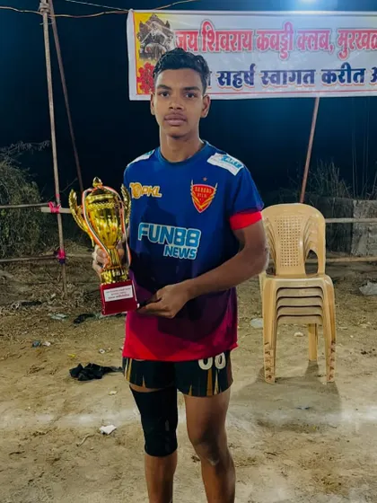 Another champion from the academy after his selection for the Sub Junior National Championship, posing with his trophy after a night tournament.